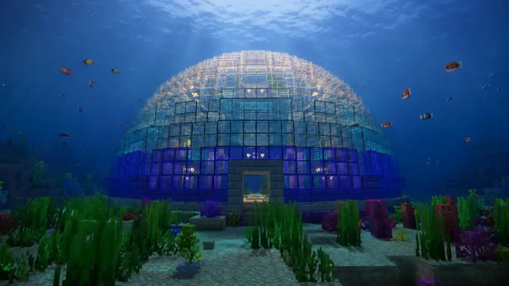 Ultra-realistic Minecraft underwater glass dome base built on the ocean floor with blue stained glass gradient, sea lantern lighting, tropical fish, coral reefs, and cinematic shader effects in 4K.